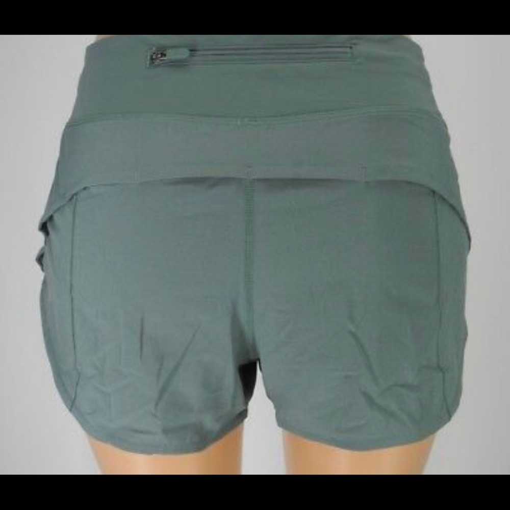 Lululemon running shorts in juniper green.